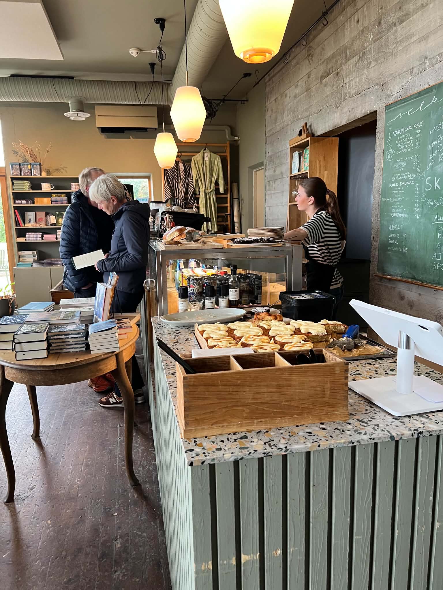 Visitors inside a small local café on Seløy in Herøy.